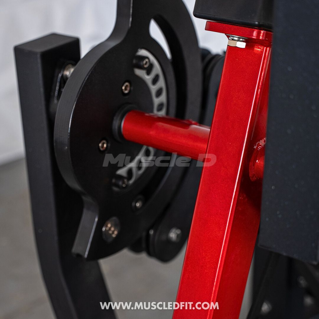 Close-up of a red and black frame of the Classic V2 Selectorized Leg Extension / Seated Leg Curl Combo with 'Muscle D' branding.