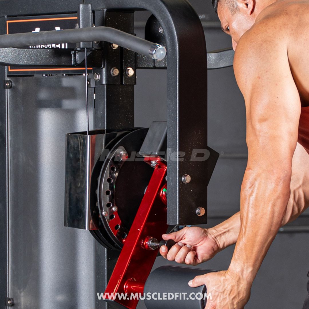 Person using a Classic V2 Multi Hip machine with visible branding on a dark background