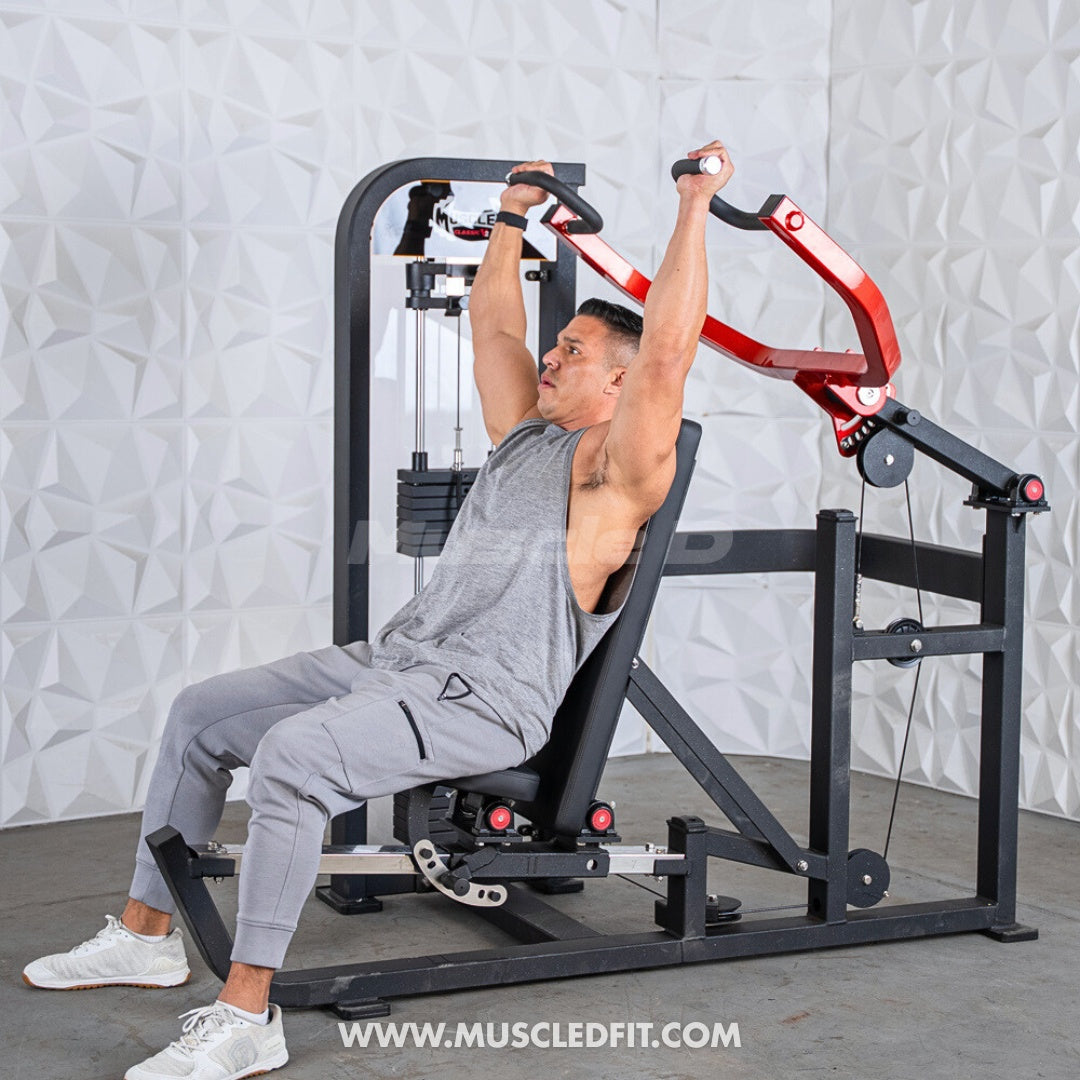 Man exercising on a Classic V2 Selectorized Multi-Press Chest & Shoulder Press machine in a gym setting.