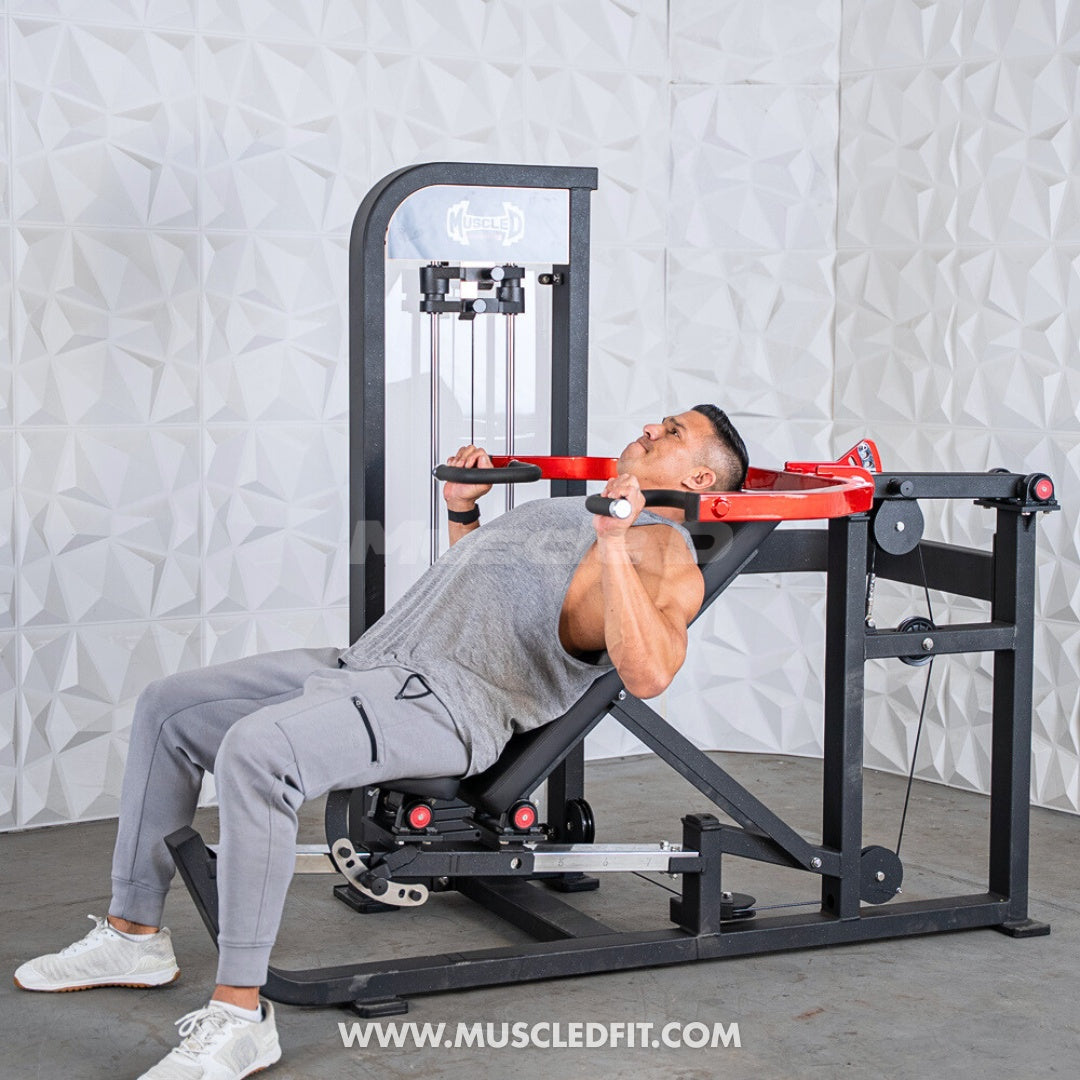 Person using a Classic V2 Selectorized Multi-Press Chest & Shoulder Press machine in a home setting with a neutral background