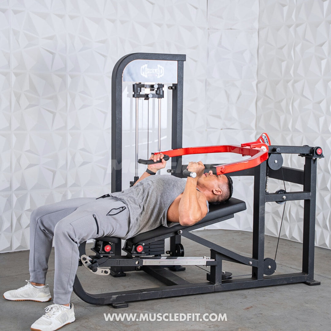Person using a Classic-V2-Selectorized-Multi-Press-Chest_Shoulder-Press-Machine with a white textured wall background