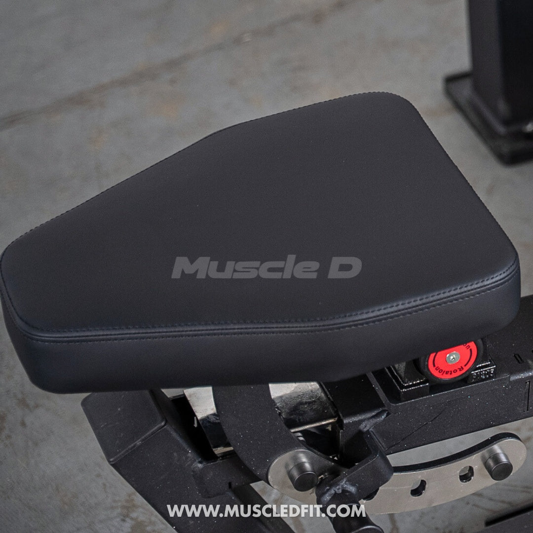 Black Classic V2 Selectorized Multi-Press Chest & Shoulder Press Machine seat with 'Muscle D' branding on a gray floor.