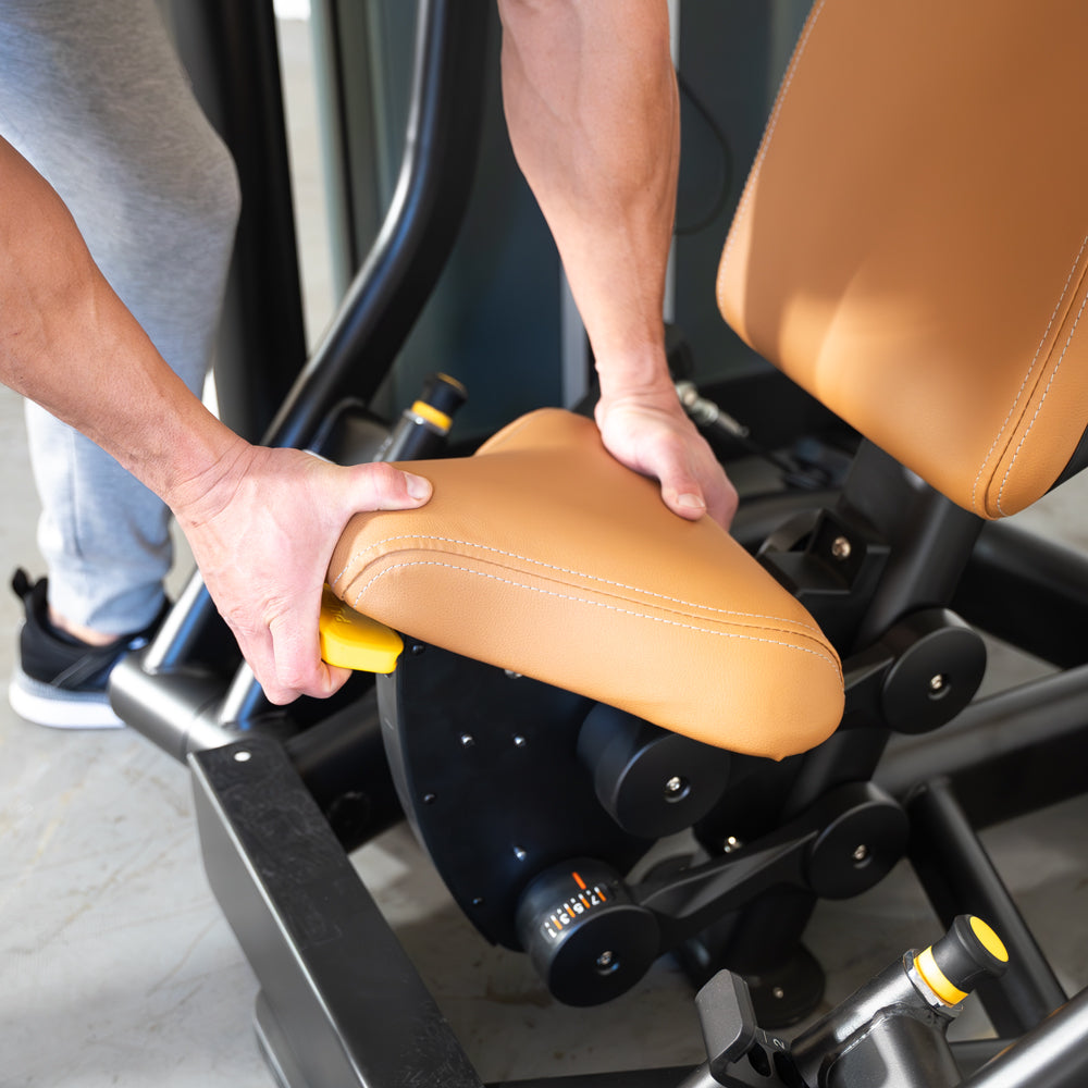 commercial black and dark grey selectorized chest press machine detail