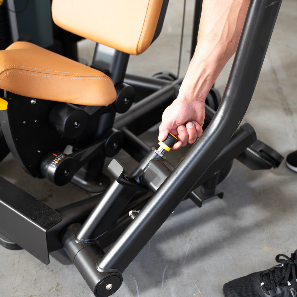 commercial black and dark grey selectorized chest press machine detail