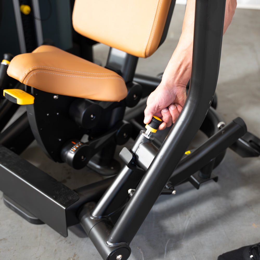 commercial black and dark grey selectorized chest press machine detail