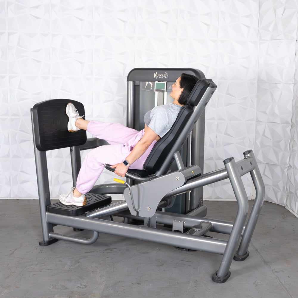 commercial black and dark grey selectorized leg press calf raise combo machine