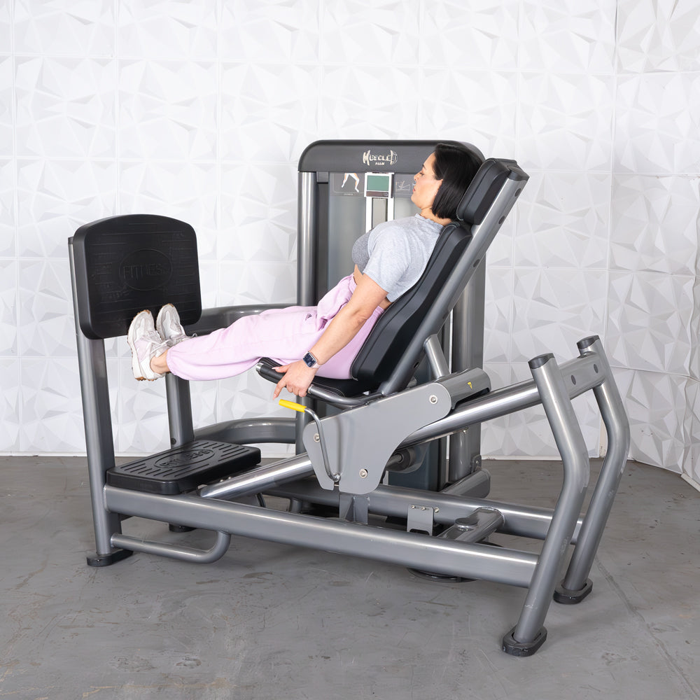 commercial black and dark grey selectorized leg press calf raise combo machine