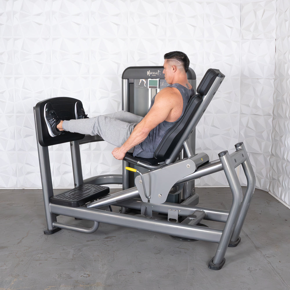 commercial black and dark grey selectorized leg press calf raise combo machine