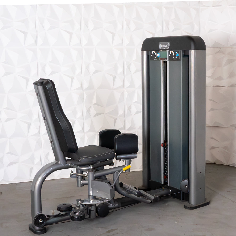 commercial black and dark grey selectorized inner outer thigh combo machine