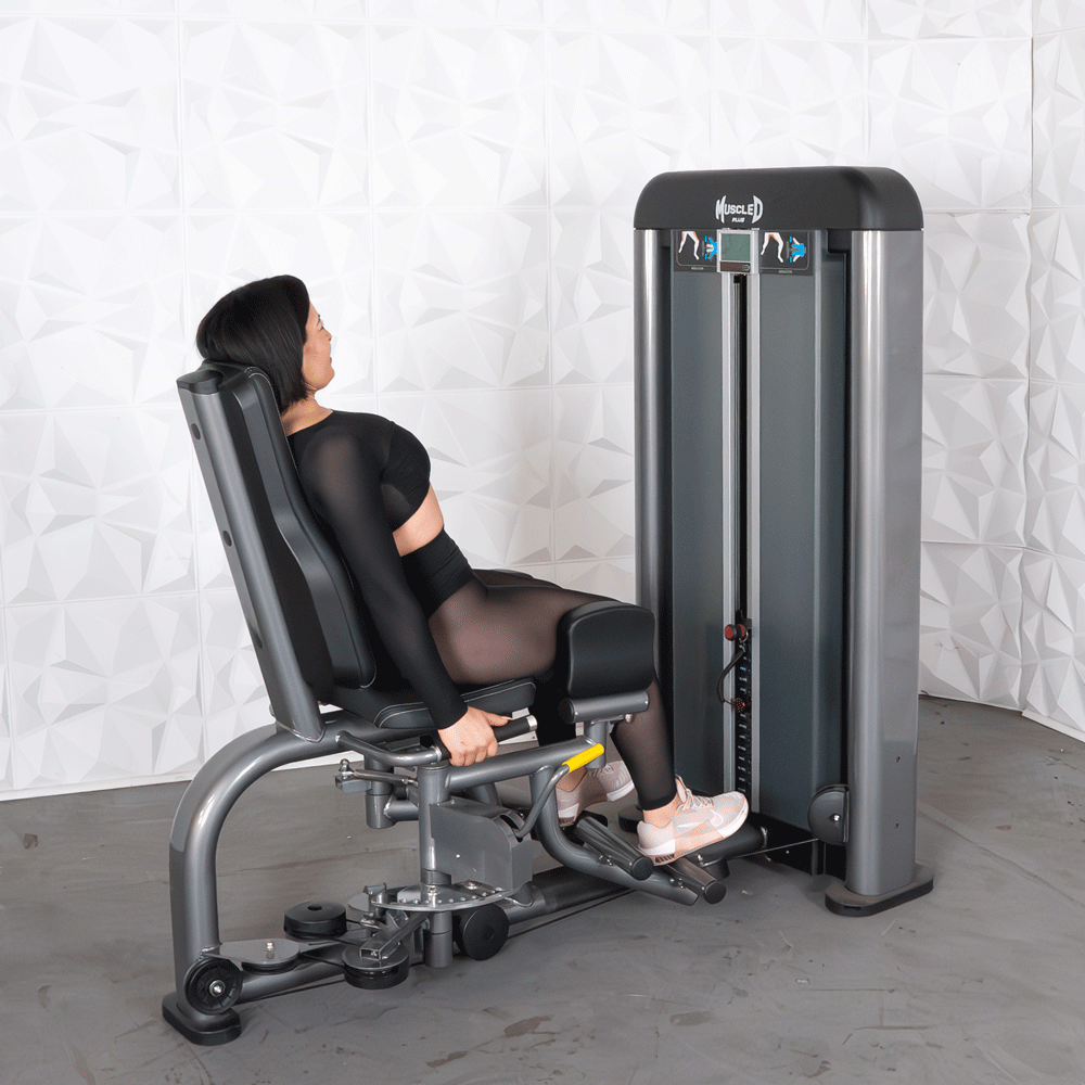 commercial black and dark grey selectorized inner outer thigh combo machine