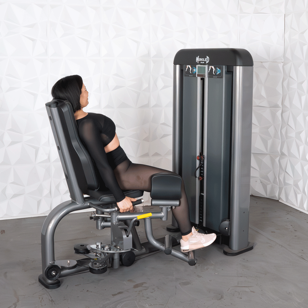commercial black and dark grey selectorized inner outer thigh combo machine