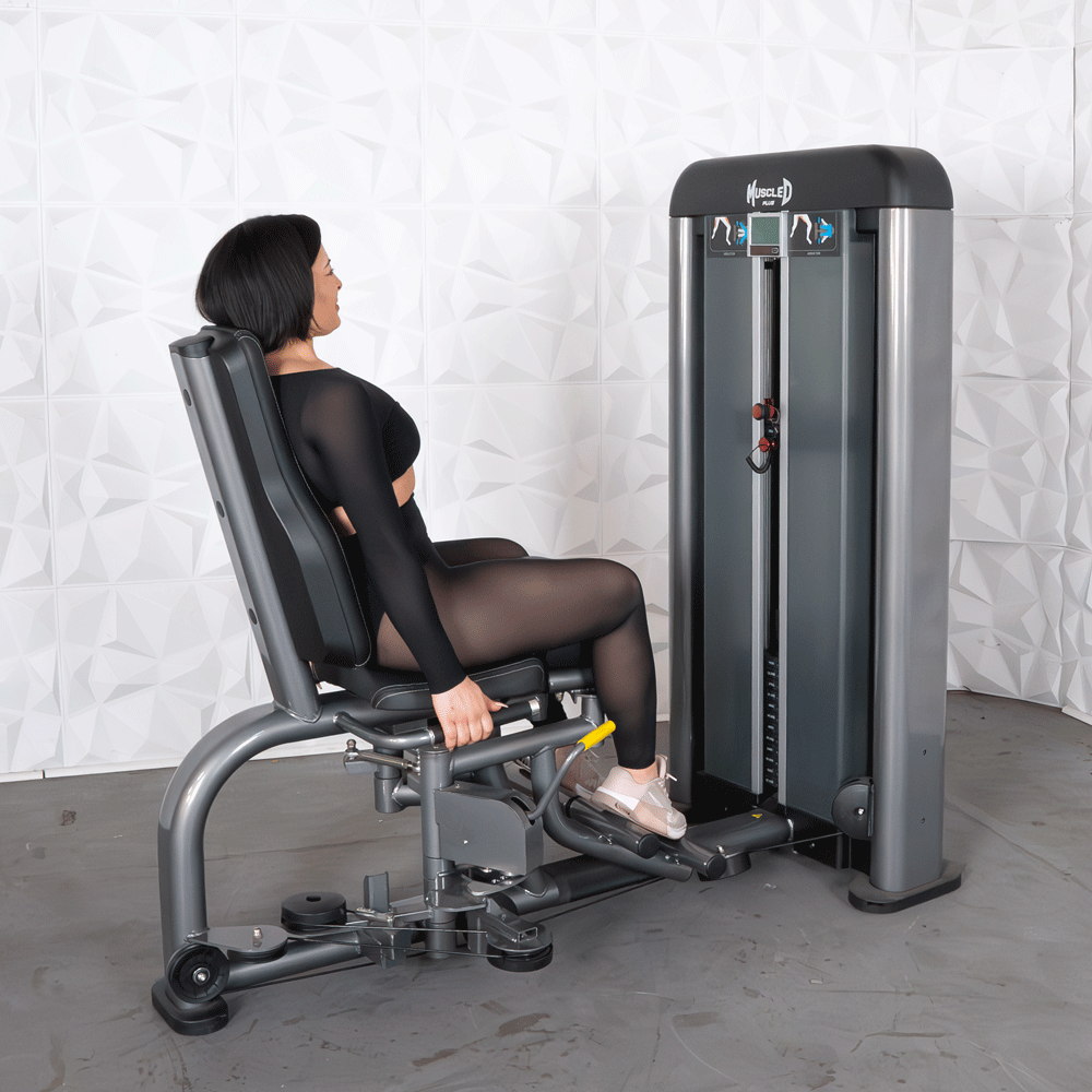 commercial black and dark grey selectorized inner outer thigh combo machine