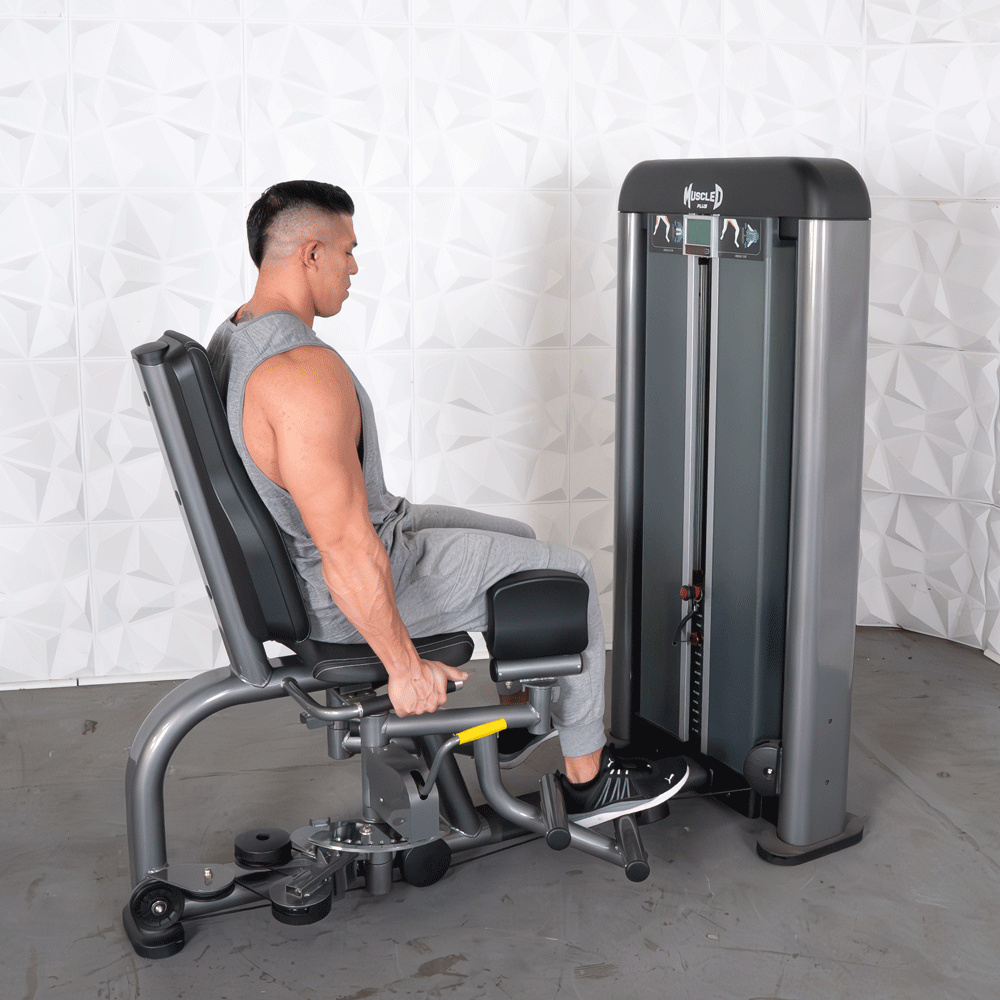 commercial black and dark grey selectorized inner outer thigh combo machine