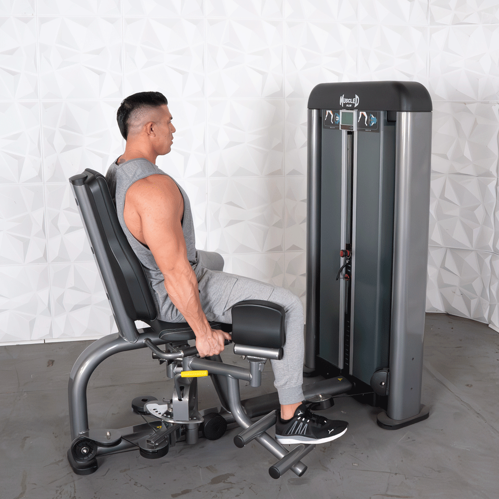 commercial black and dark grey selectorized inner outer thigh combo machine