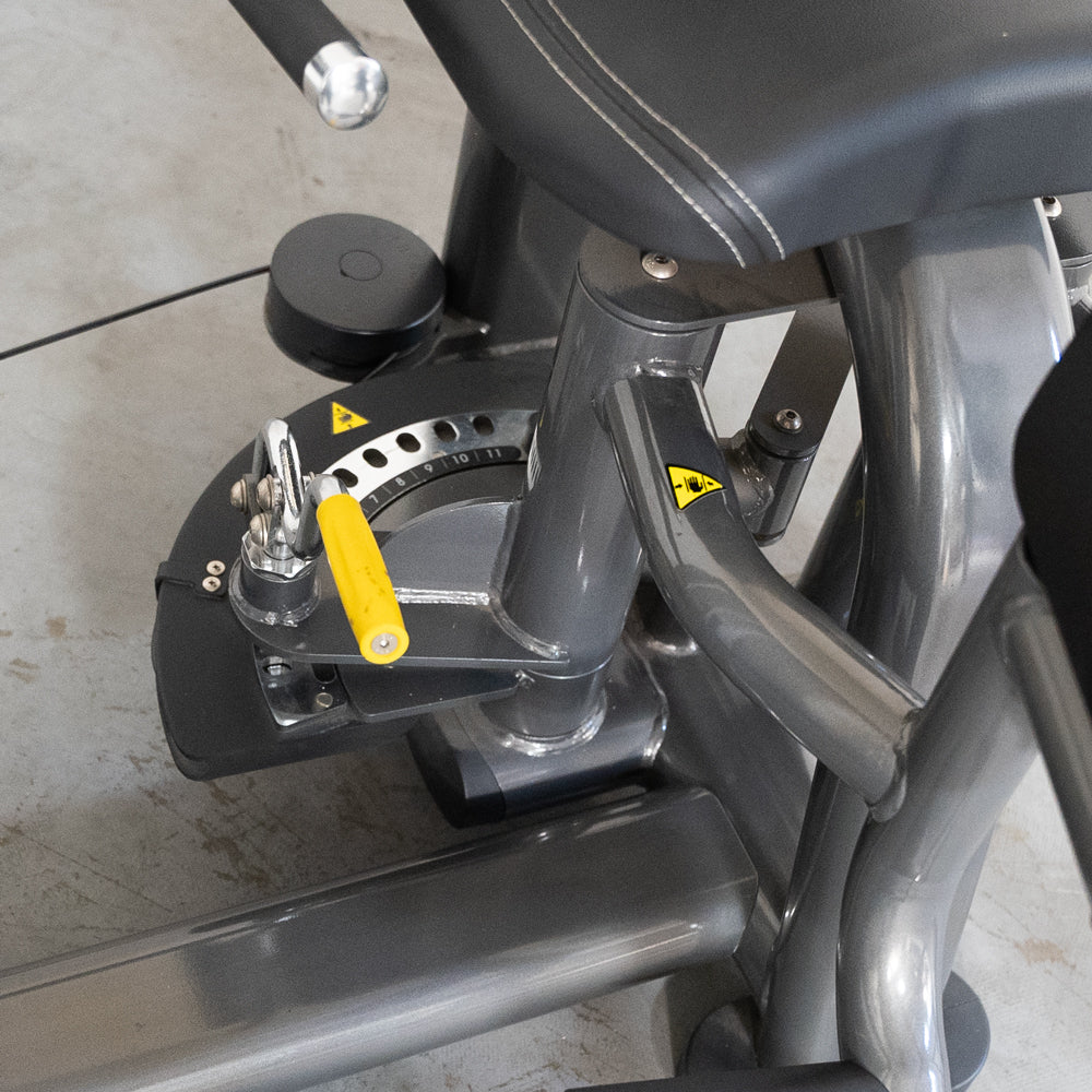 commercial selectorized black and dark grey inner thigh machine detail