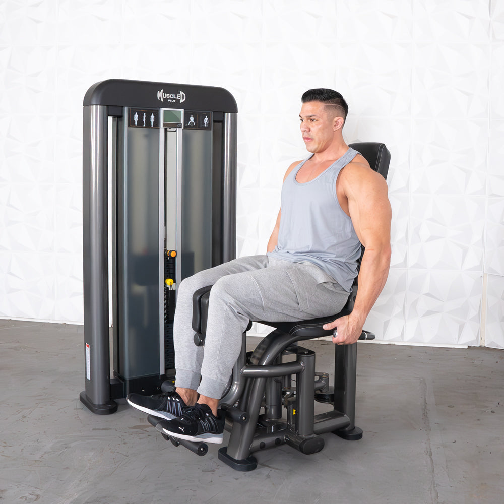 commercial selectorized black and dark grey inner thigh machine
