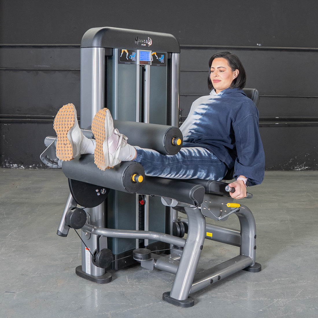 muscle d fitness commercial selectorized black and dark grey elite plus leg extension seated leg curl combo leg machine