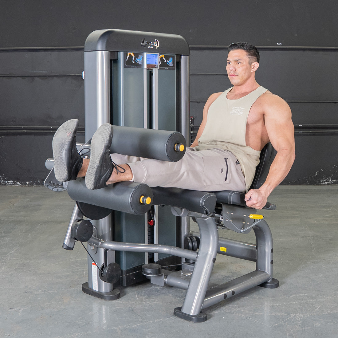 muscle d fitness commercial selectorized black and dark grey elite plus leg extension seated leg curl combo leg machine