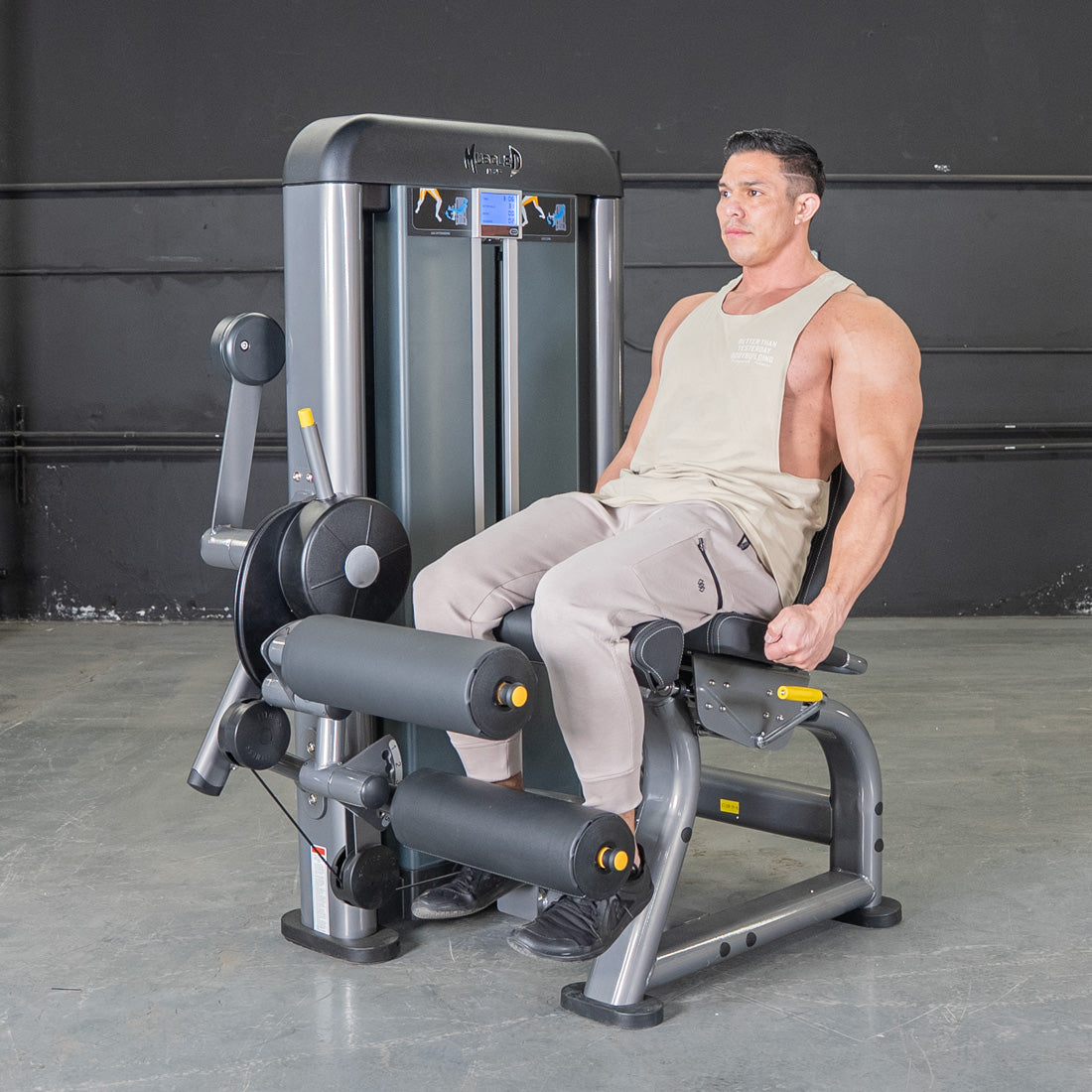 muscle d fitness commercial selectorized black and dark grey elite plus leg extension seated leg curl combo leg machine