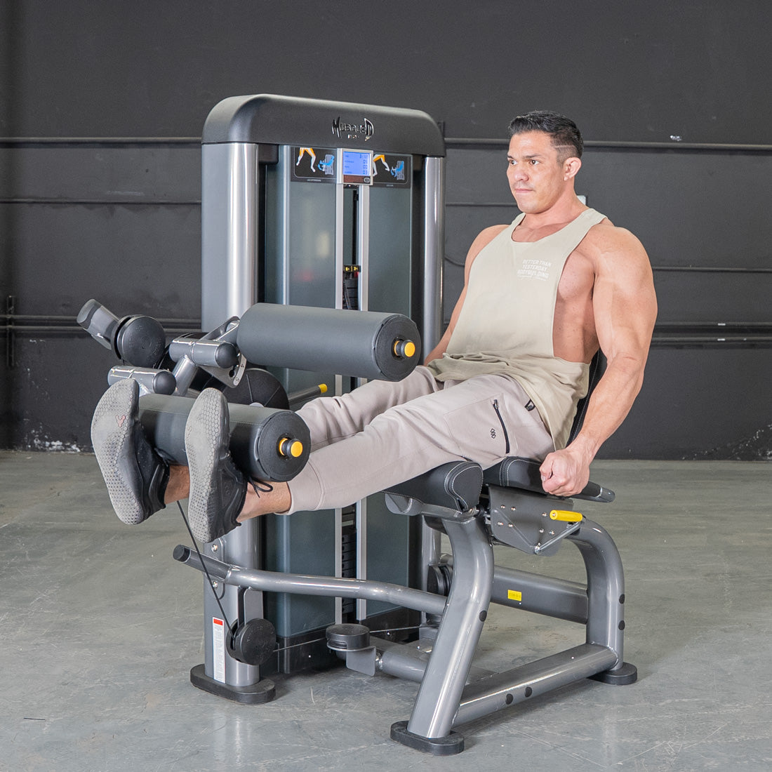 muscle d fitness commercial selectorized black and dark grey elite plus leg extension seated leg curl combo leg machine