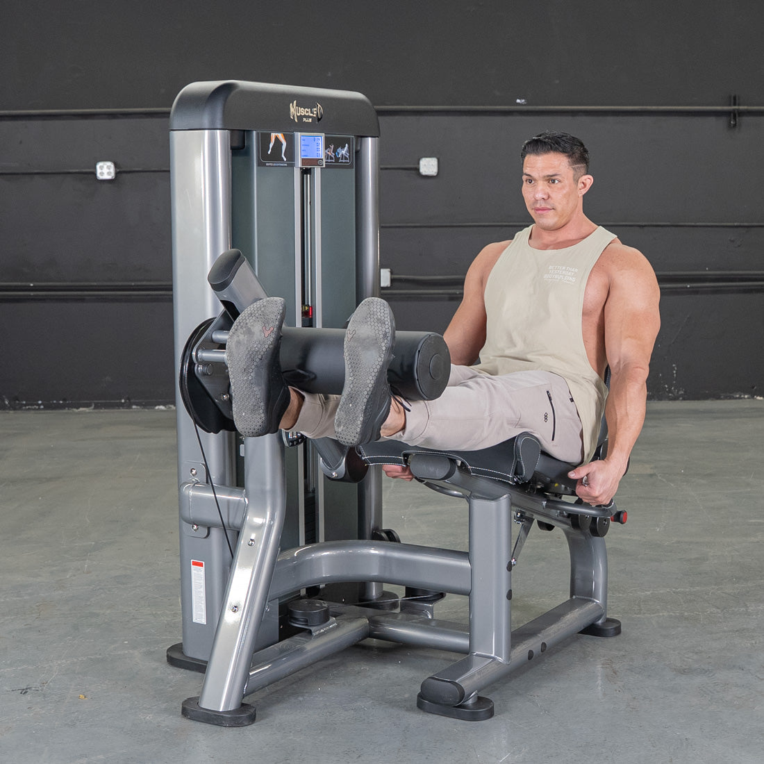 muscle d fitness commercial selectorized black and dark grey elite plus leg extension leg machine