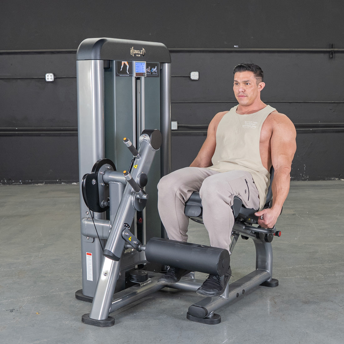 muscle d fitness commercial selectorized black and dark grey elite plus leg extension leg machine