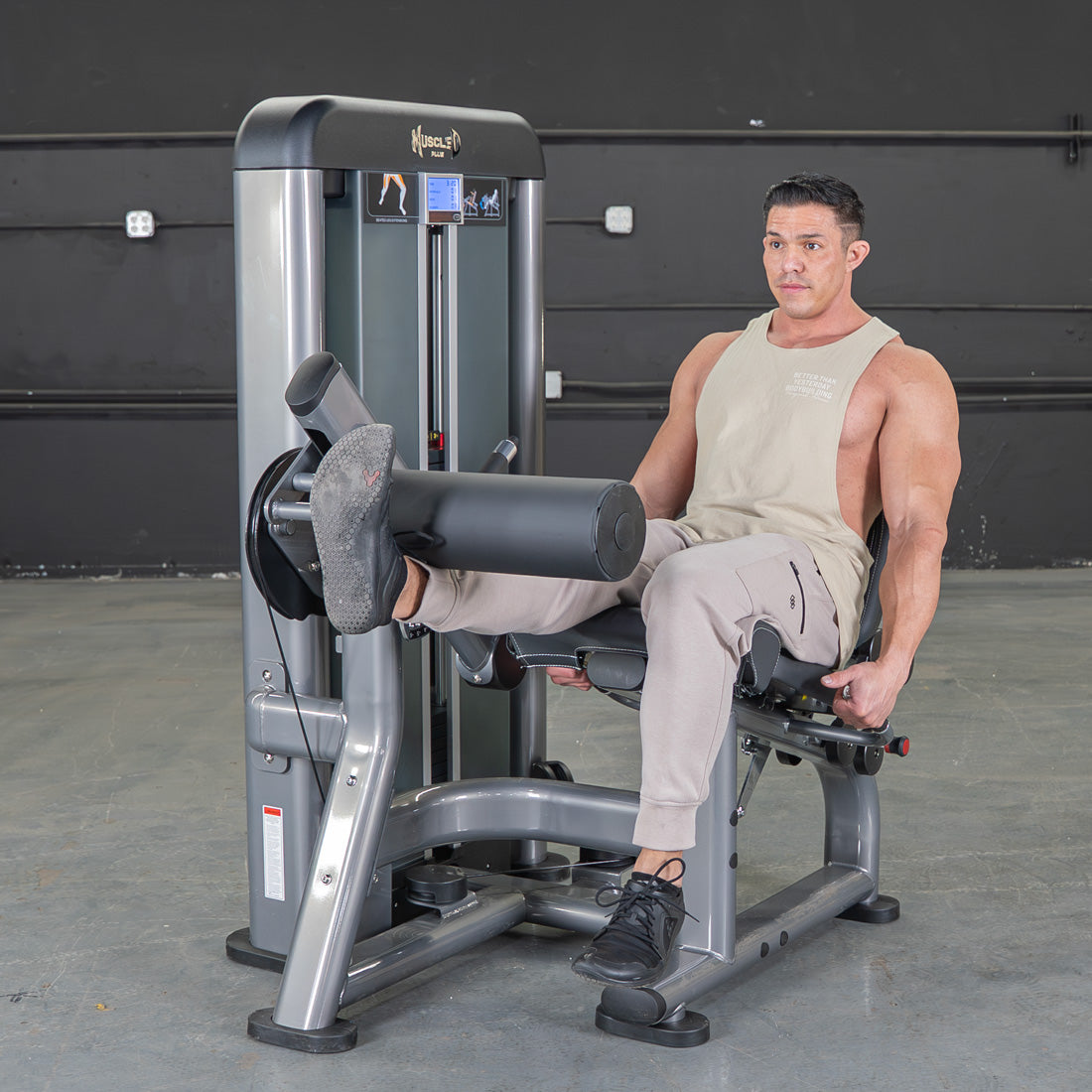 muscle d fitness commercial selectorized black and dark grey elite plus leg extension leg machine