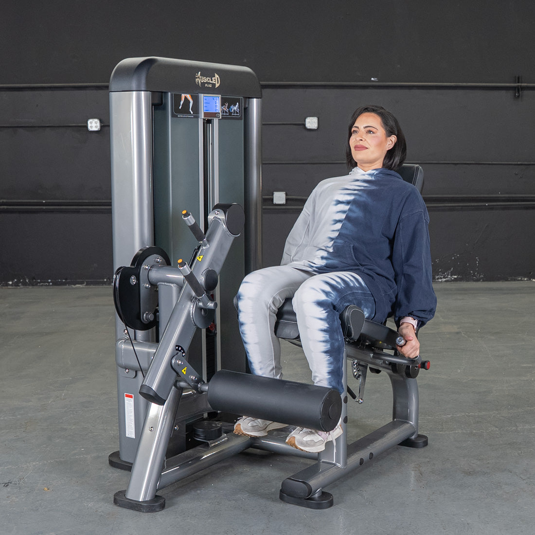 muscle d fitness commercial selectorized black and dark grey elite plus leg extension leg machine