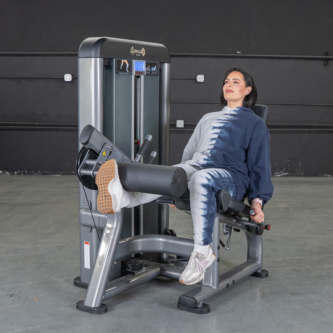 muscle d fitness commercial selectorized black and dark grey elite plus leg extension leg machine