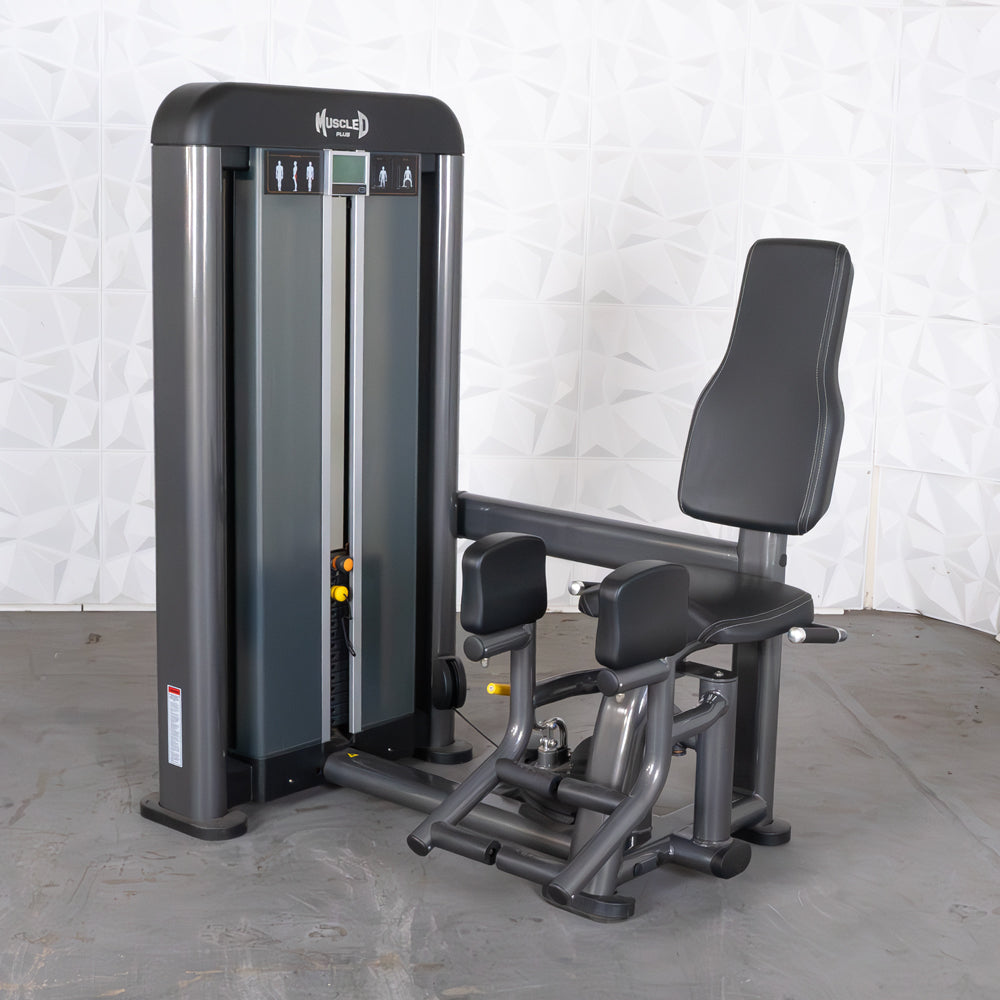 commercial selectorized black and dark grey outer thigh machine