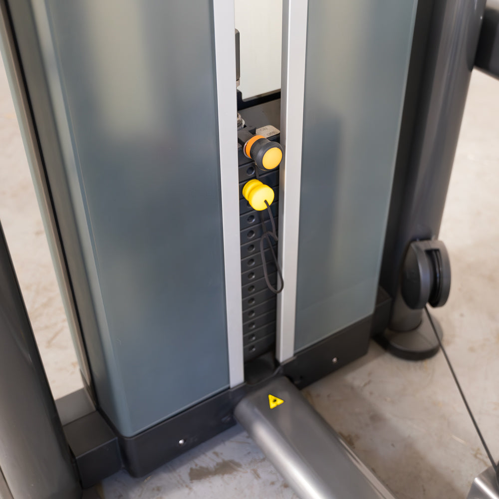 commercial selectorized black and dark grey outer thigh machine detail