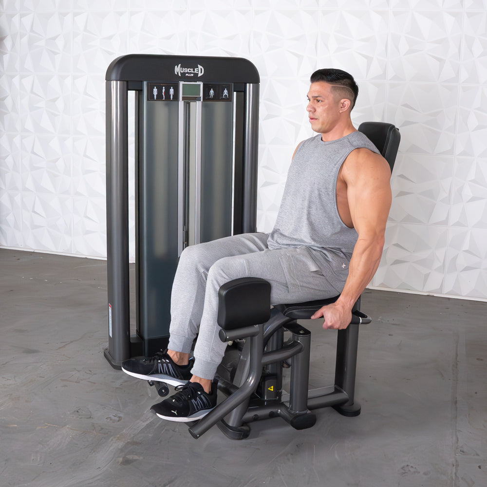 commercial selectorized black and dark grey outer thigh machine