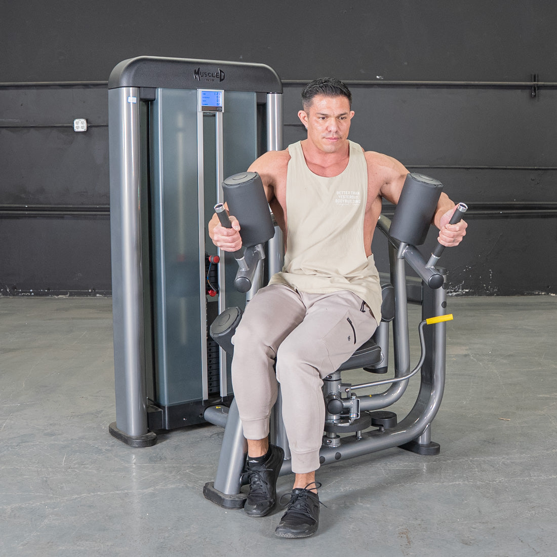muscle d fitness commercial selectorized black and dark grey elite plus rotary torso machine