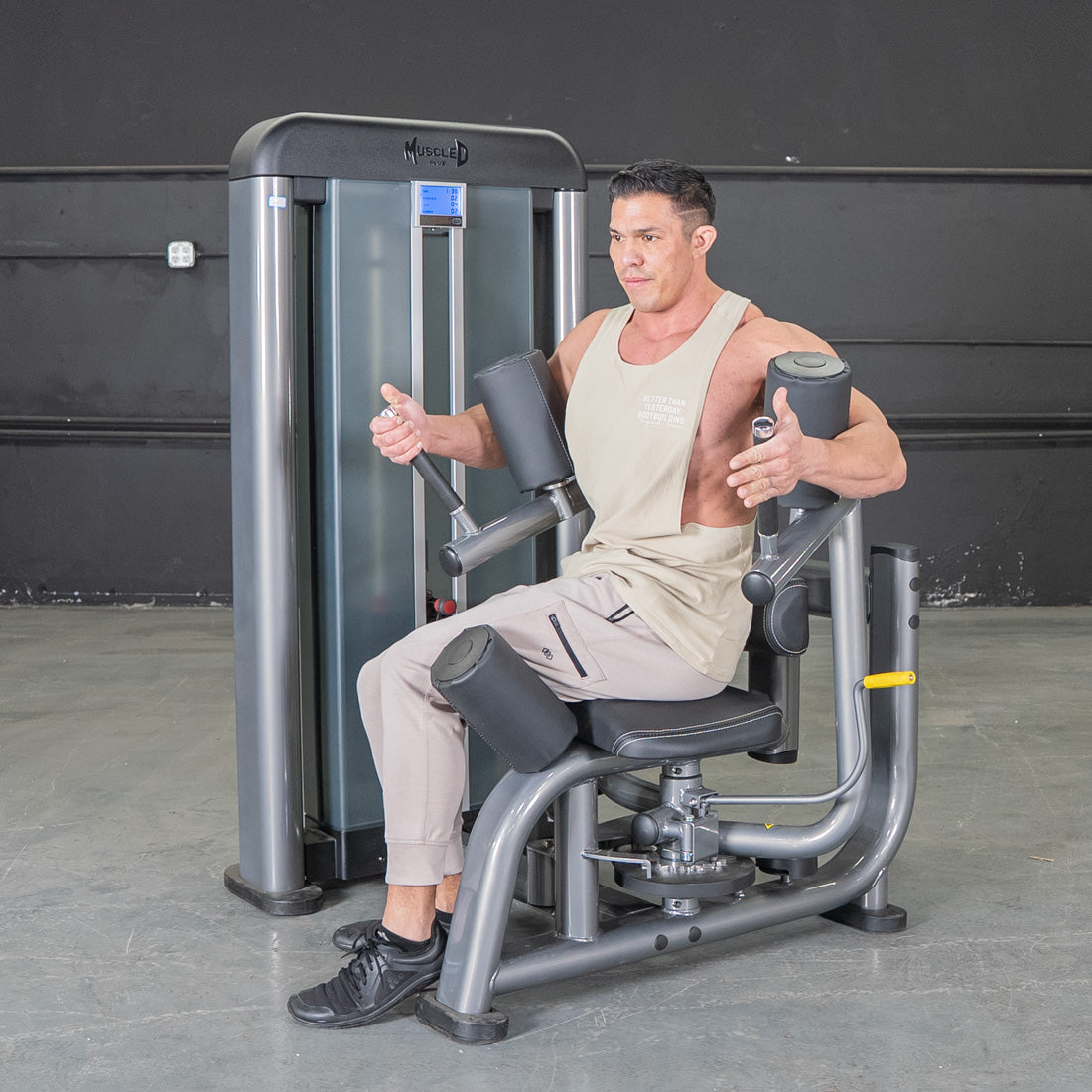 muscle d fitness commercial selectorized black and dark grey elite plus rotary torso machine