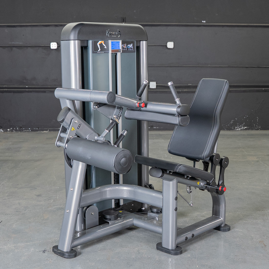 muscle d fitness commercial selectorized black and dark grey elite plus seated leg curl machine