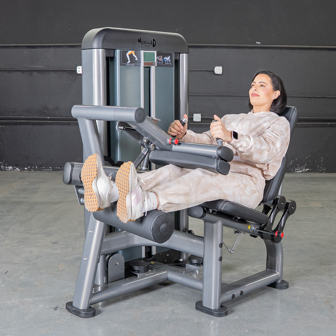 muscle d fitness commercial selectorized black and dark grey elite plus seated leg curl machine