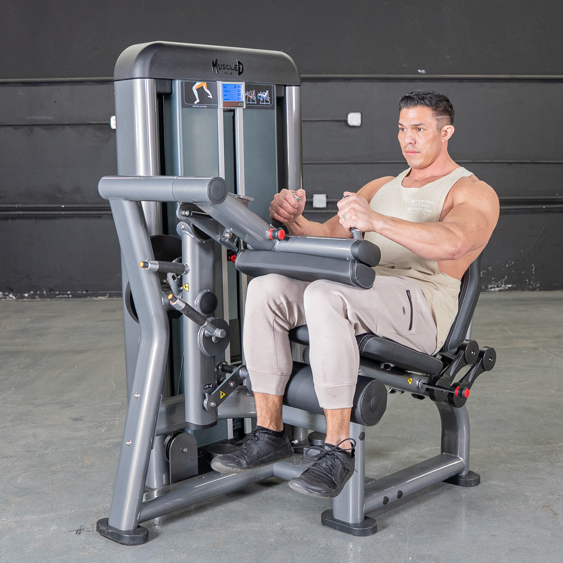 muscle d fitness commercial selectorized black and dark grey elite plus seated leg curl machine