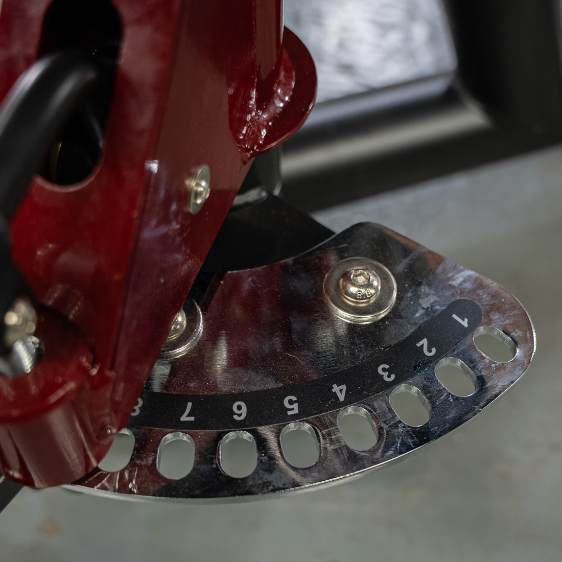 muscle d fitness commercial plate loaded black and maroon handle power leverage v2 abductor/adductor machine detail