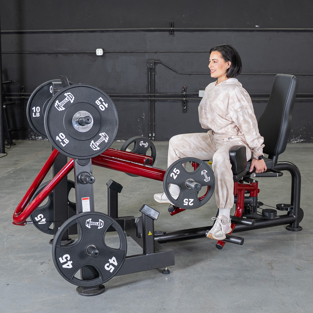 muscle d fitness commercial plate loaded black and maroon handle power leverage v2 abductor/adductor machine