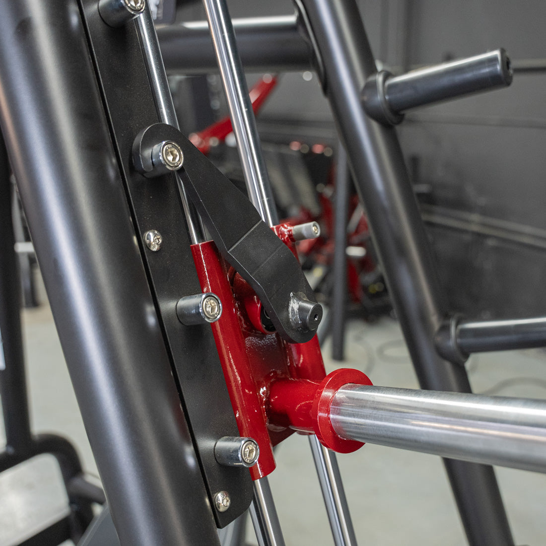 muscle d fitness commercial plate loaded black and maroon handle power leverage v2 convergent bench machine safety stop detail