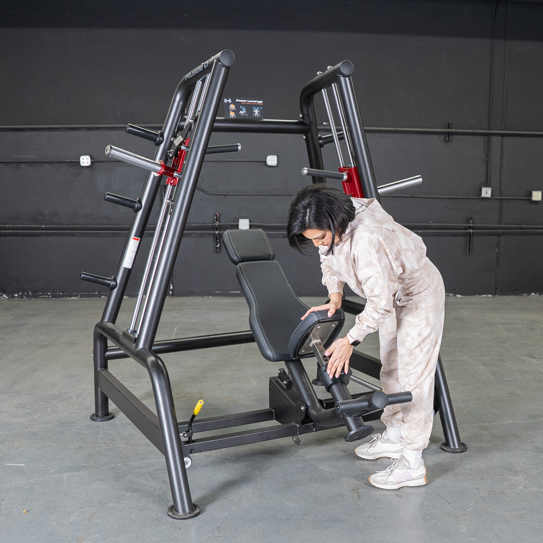 muscle d fitness commercial plate loaded black and maroon handle power leverage v2 convergent bench machine