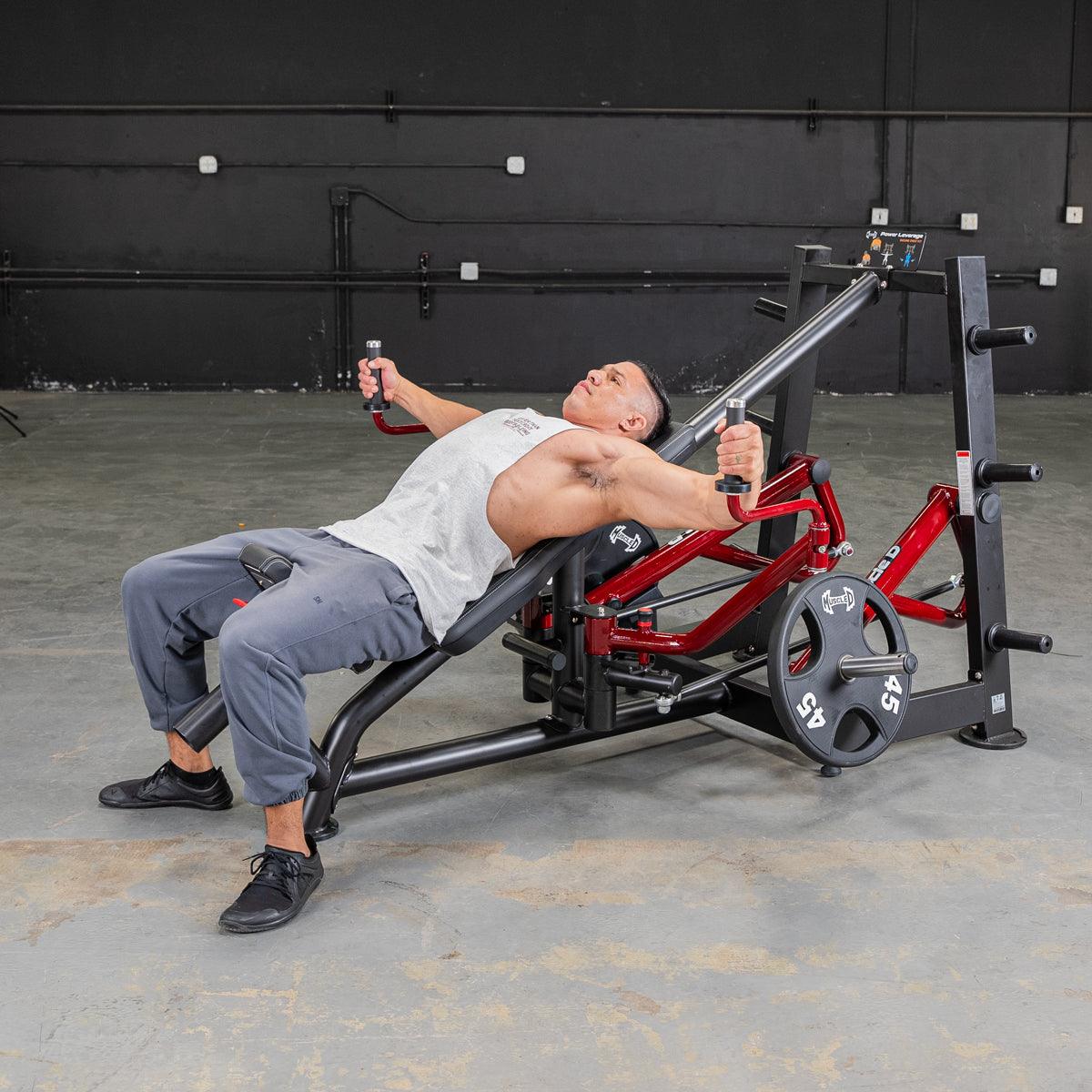 A person using the Power Leverage V2 Decline Chest Fly machine in a gym setting, targeting the chest muscles.