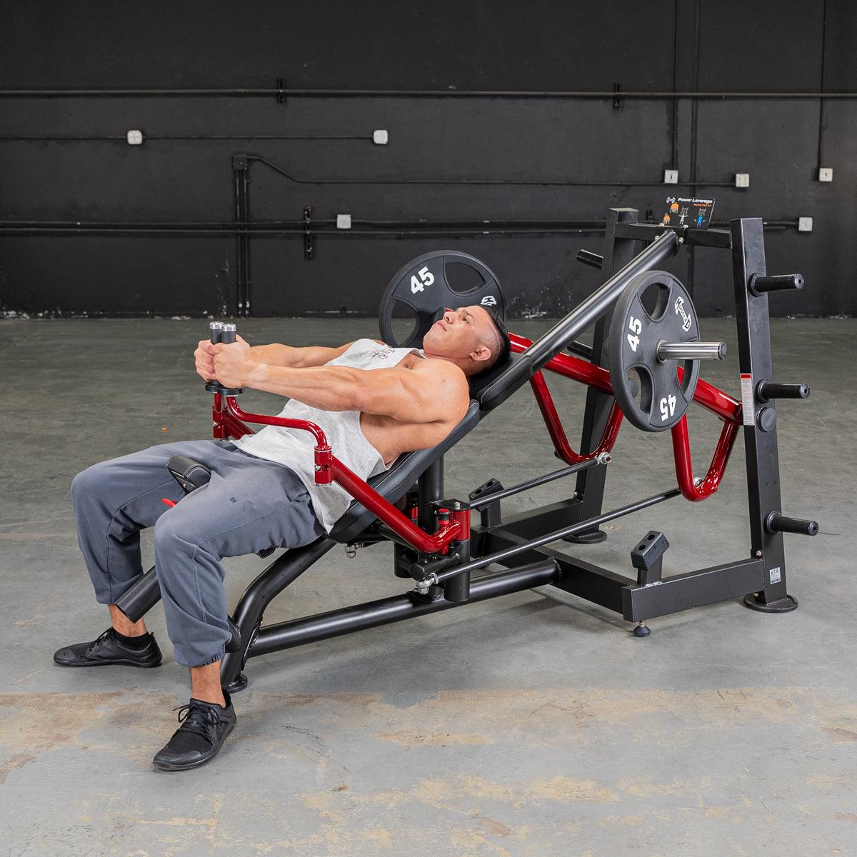 Man using a Power Leverage V2 Decline Chest Fly in a gym setting by Muscle D Fitness