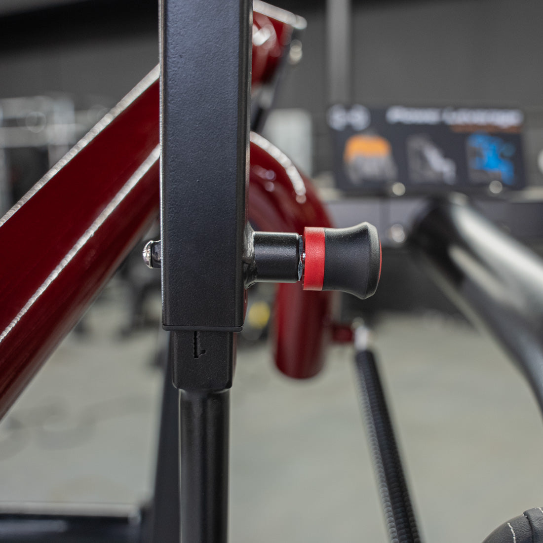 muscle d fitness commercial plate loaded black and maroon power leverage v2 iso lateral incline chest press machine adjustment knob detail