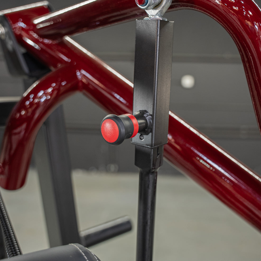 muscle d fitness commercial plate loaded black and maroon power leverage v2 iso lateral incline chest press machine adjustment knob detail