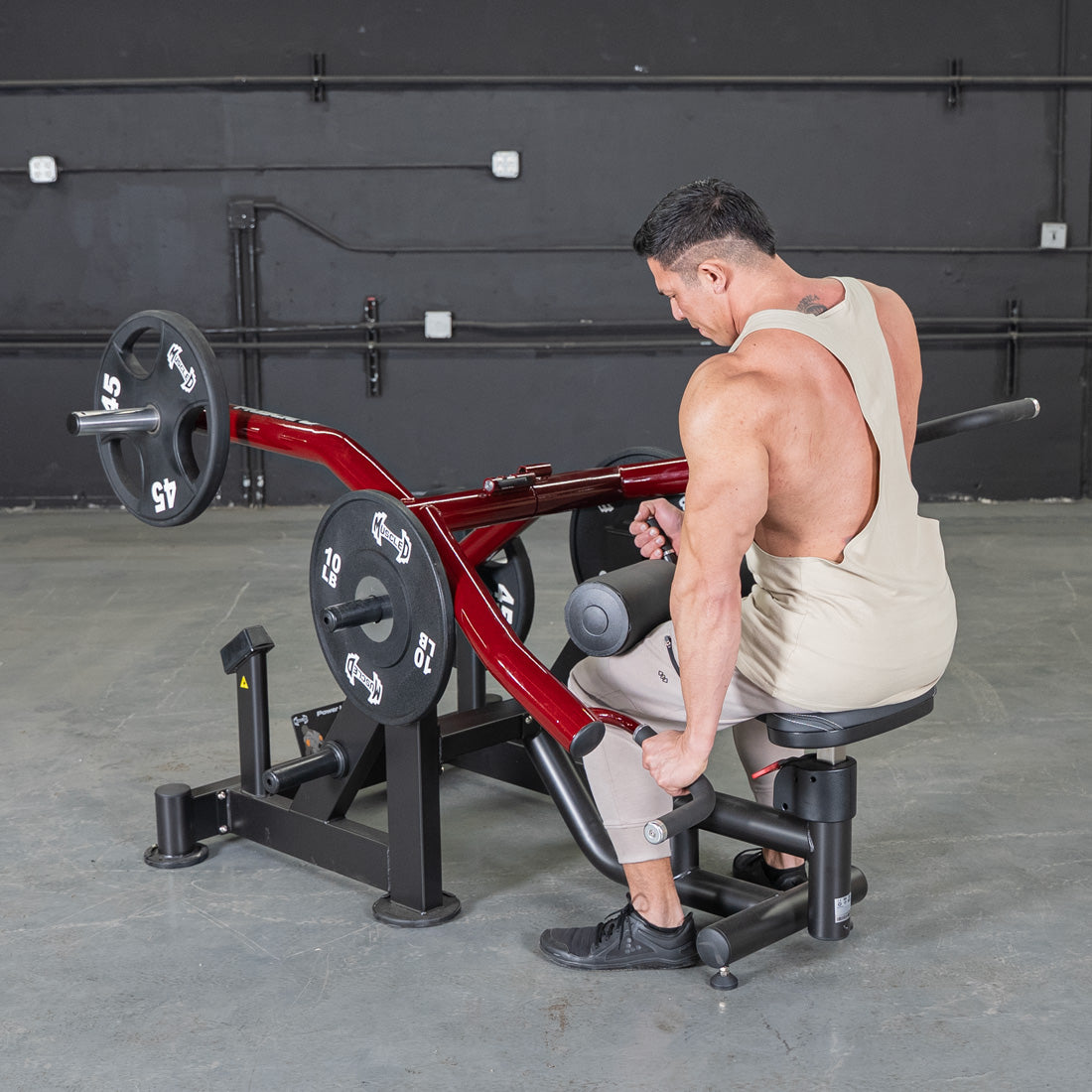muscle d fitness commercial plate loaded black and maroon power leverage v2 iso lateral dip machine
