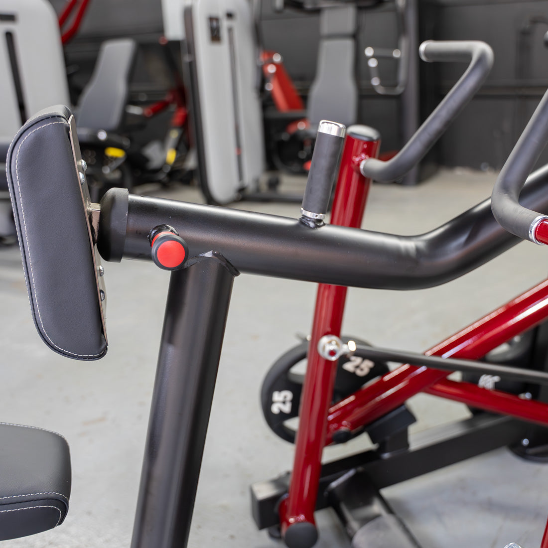 muscle d fitness commercial plate loaded power leverage v2 black and maroon iso-lateral seated row machine detail