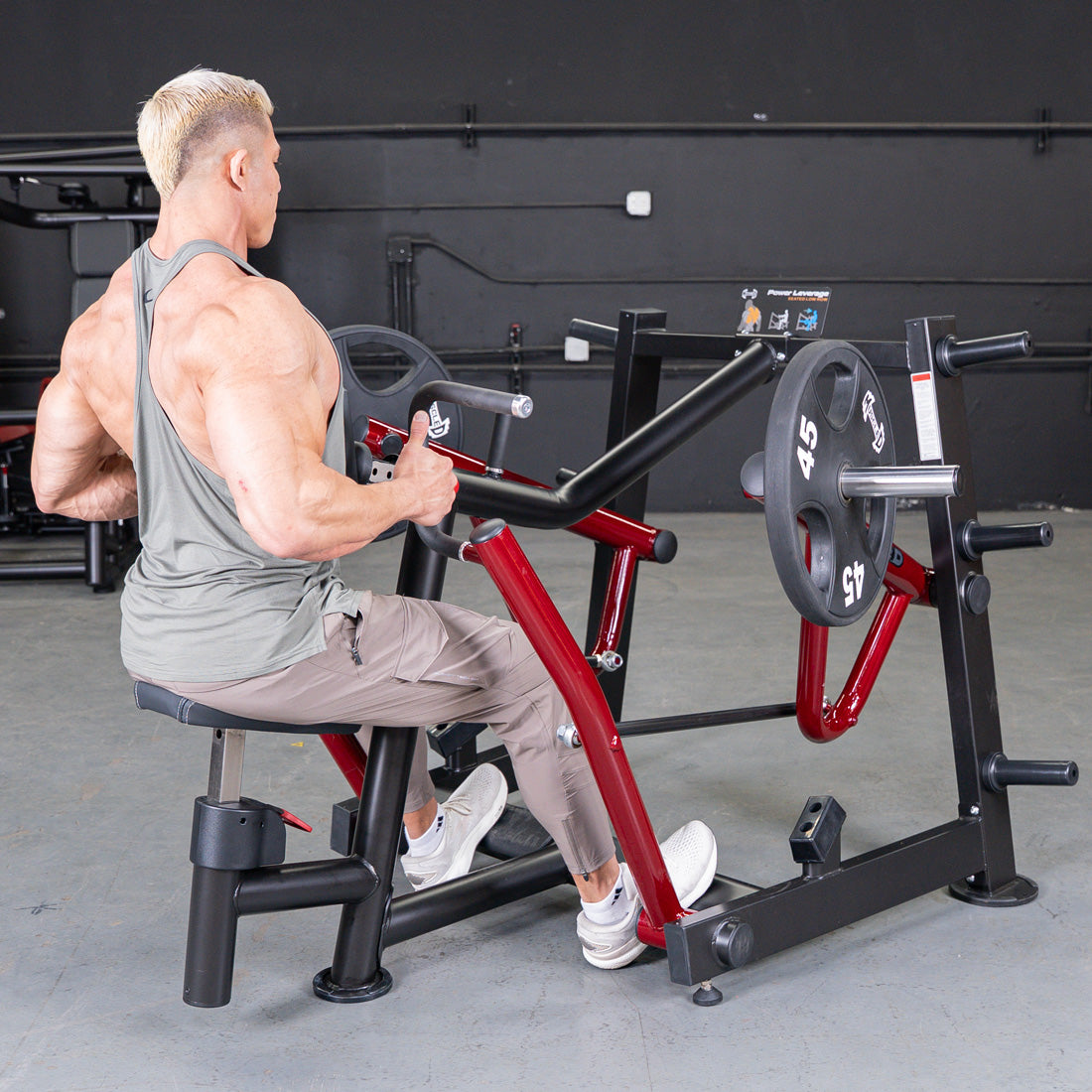 muscle d fitness commercial plate loaded power leverage v2 black and maroon iso-lateral seated row machine