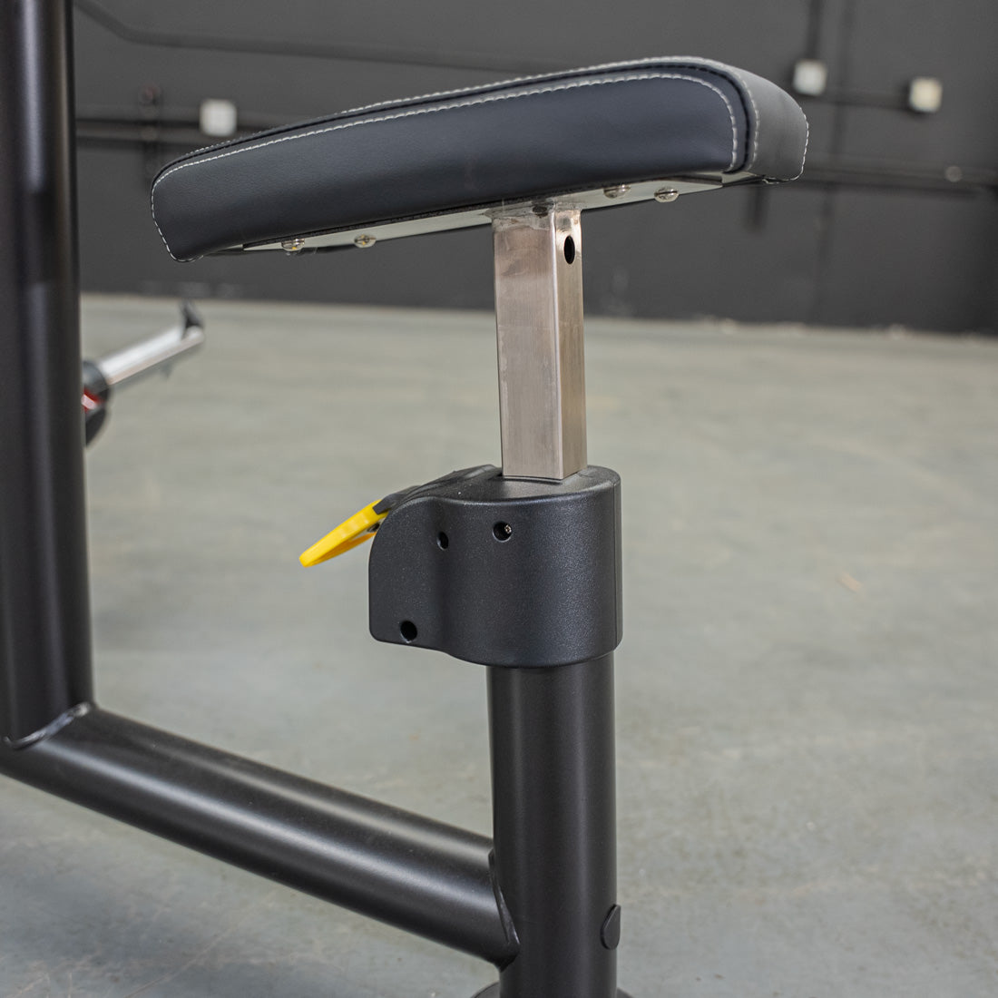 muscle d fitness commercial plate loaded black and maroon power leverage v2 iso lateral raise machine seat detail