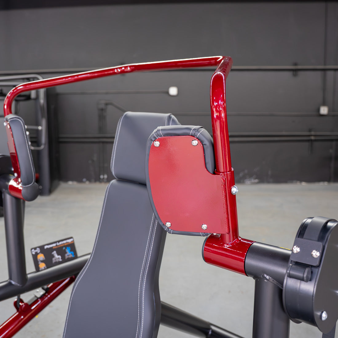 muscle d fitness commercial plate loaded power leverage v2 black and maroon pull-over machine detail